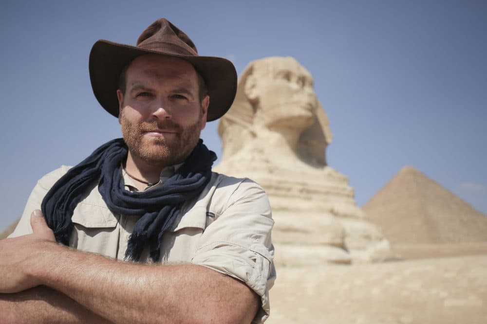 Josh Gates, host of Discovery's &quot;Expedition Unknown,&quot; in front of the Sphinx in Giza, Egypt. (Courtesy of Discovery)