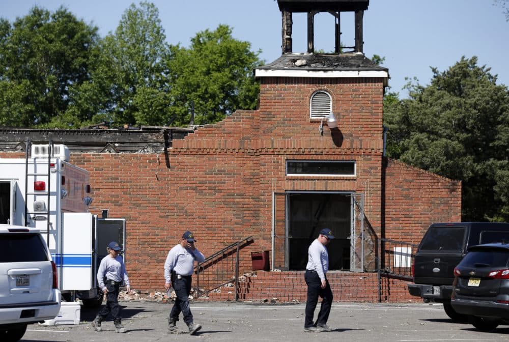 Alcohol Tobacco and Firearms Bureau investigators work the crime scene of the burnt ruins of the Mount Pleasant Baptist Church, one of three that recently burned down in St. Landry Parish, in Opelousas, La., Wednesday, April 10, 2019. (Gerald Herbert/AP)