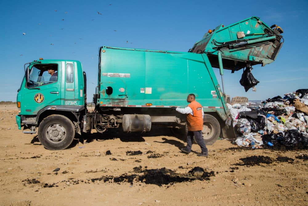 We're taking a closer look at waste — and we'd love to hear from you. Pictured: Baltimore City trash is dropped off at the Quarantine Road Landfill. (Rosem Morton for Here & Now)