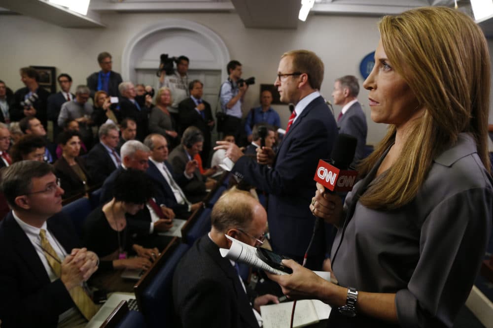 Jessica Yellin of CNN gets ready to do her stand-up from the James Brady Press Briefing Room before President Barack Obama's news conference at the White House in Washington, Tuesday, April 30, 2013. (Charles Dharapak/AP)