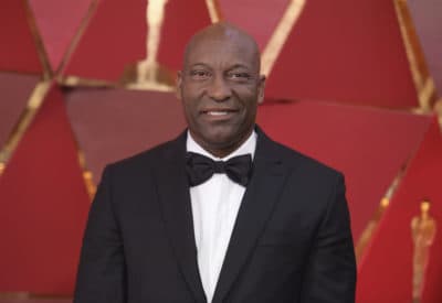 John Singleton arrives at the Oscars on Sunday, March 4, 2018, at the Dolby Theatre in Los Angeles. (Richard Shotwell/Invision/AP)