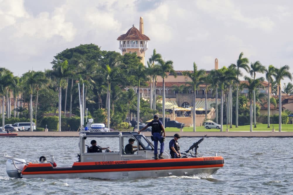 The U.S. Coast Guard patrol boat passes President Donald Trump's Mar-a-Lago estate in Palm Beach, Fla., Thursday, Nov. 22, 2018. (J. David Ake/AP)