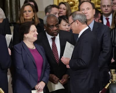 Supreme Court Chief Justice John Roberts talks with Justices Elena Kagan, Clarence Thomas and Samuel Alito at services for former President George H.W. Bush on Dec. 3, 2018. (Pablo Martinez Monsivais/AP)