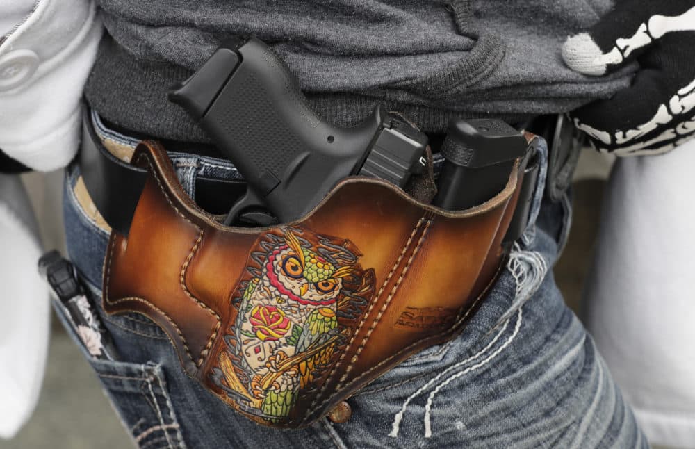 Jessica Marshall, of Roy, Wash., wears a Glock 9mm pistol in a holster at a gun-rights rally, Friday, Jan. 18, 2019 in Olympia, Wash. (Ted S. Warren/AP)