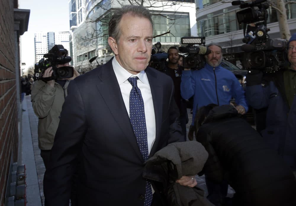 Gordon Ernst, former Georgetown tennis coach, departs federal court in Boston on Monday, March 25, 2019, after facing charges in a nationwide college admissions bribery scandal. (Steven Senne/AP)