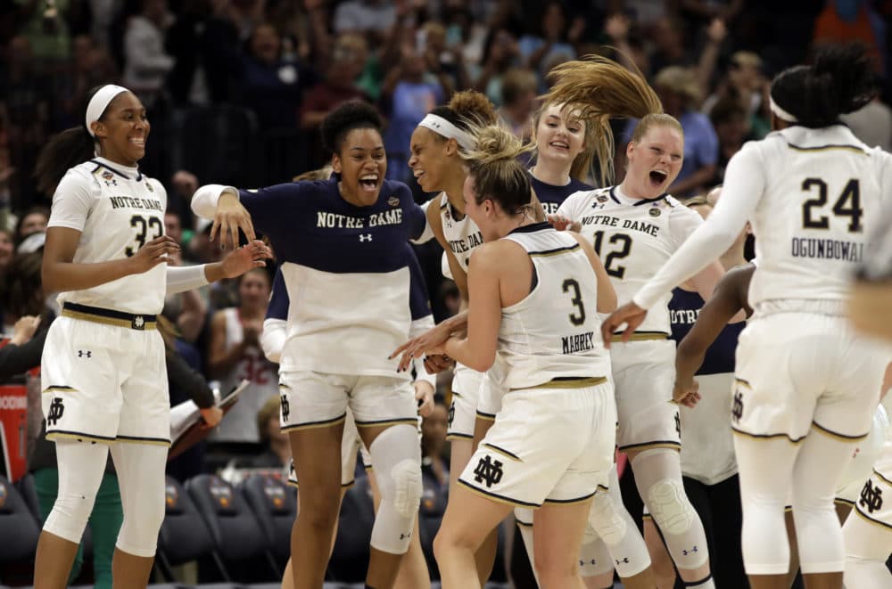 The Notre Dame team celebrate at the end of the second half of a women's Final Four NCAA college basketball semifinal tournament game against Connecticut, Friday, April 5, 2019, in Tampa, Fla. (Chris O'Meara/AP)