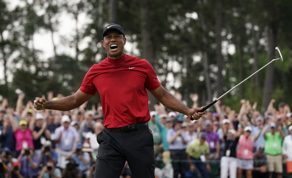 Tiger Woods reacts as he wins the Masters golf tournament Sunday, April 14, 2019, in Augusta, Ga. (David J. Phillip/AP)