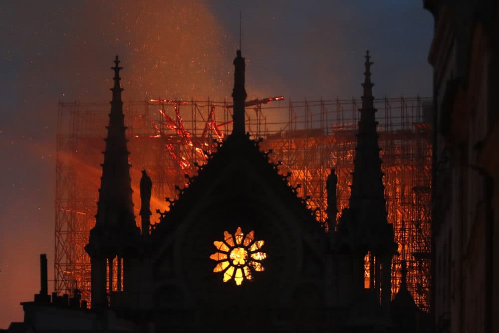 Flames and smoke rise from Notre Dame cathedral as it burns in Paris, Monday, April 15, 2019. (Thibault Camus/AP)