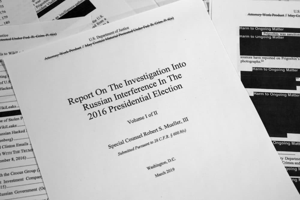 Special counsel Robert Mueller's redacted report on Russian interference in the 2016 presidential election as released on Thursday, April 18, 2019, is photographed in Washington. (Jon Elswick/AP)