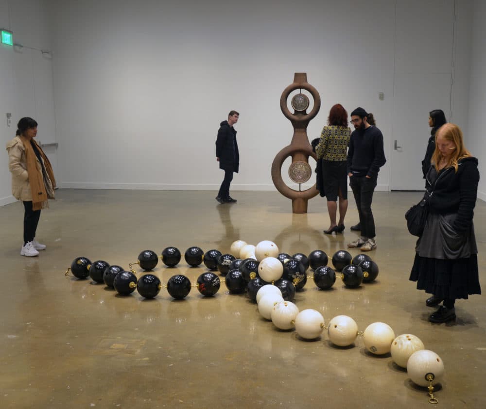 A group of visitors look at Kathleen Ryan’s sculptures at the MIT List Visual Arts Center (Courtesy)