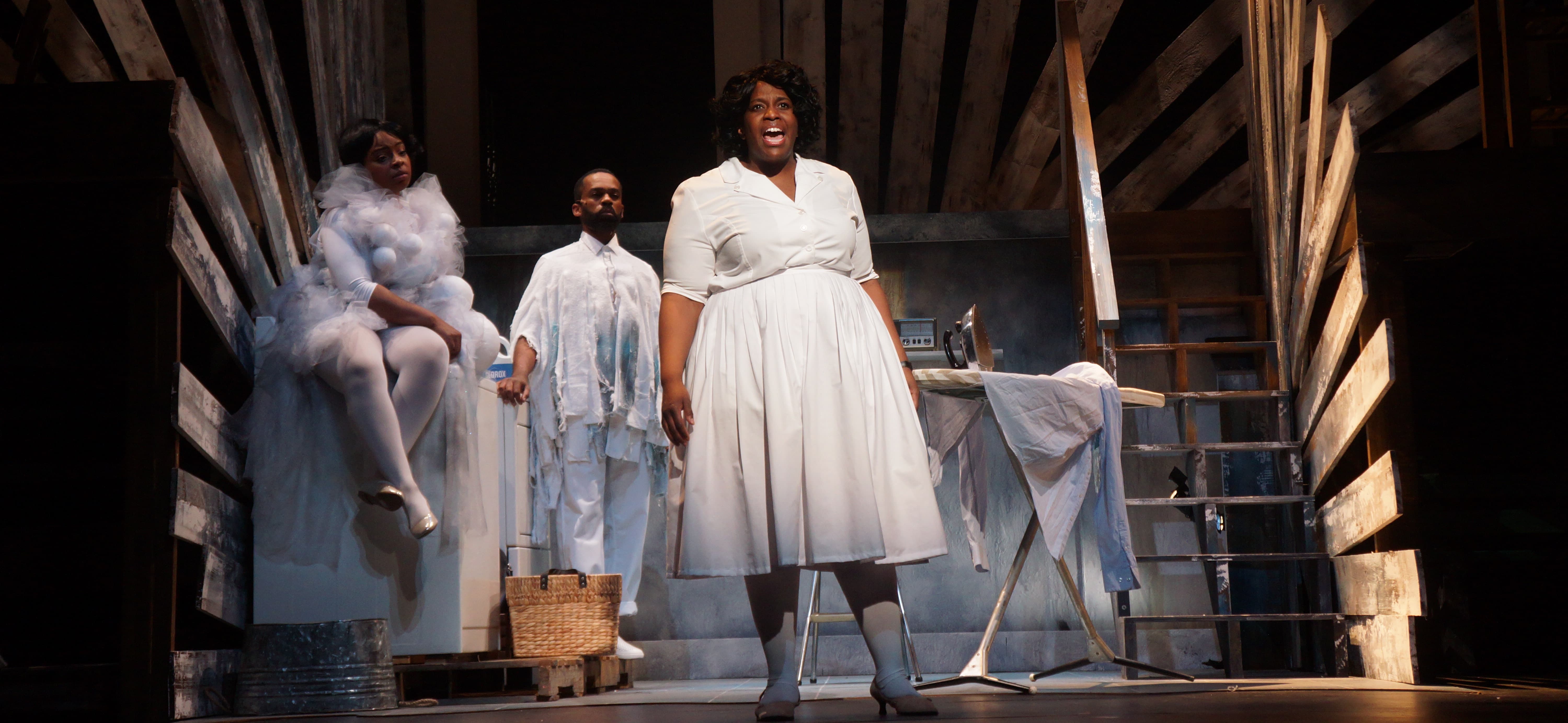 Yewande Odetoyinbo (right) as Caroline in Moonbox Productions' &quot;Caroline, or Change&quot; at the Calderwood Pavilion. Pier Lamia Porter and Davron S. Monroe give life to the washer and dryer. (Courtesy Sharman Altshuler)