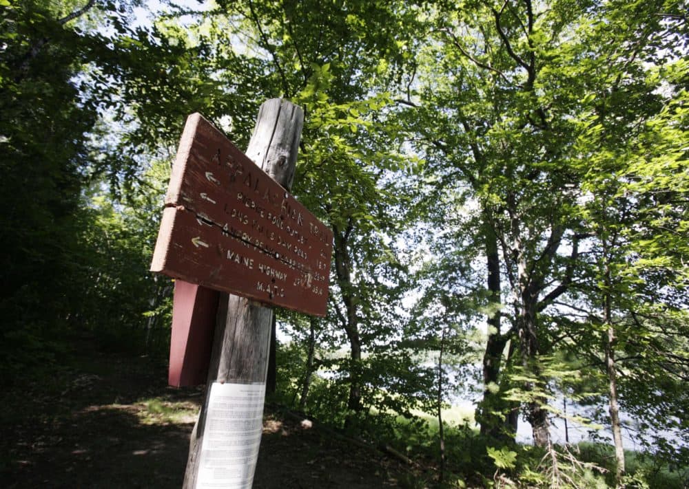In this July 2011 photo, a sign directs hikers to nearby points of interest near the Kennebec River in Carrying Place Township, Maine. (Pat Wellenbach/AP)