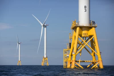 Three of Deepwater Wind's five turbines stand in the water off Block Island, Rhode Island, seen in August 2016. (Michael Dwyer/AP)