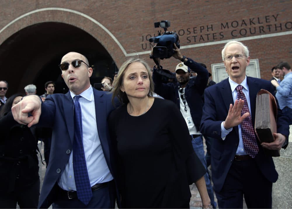 District Court Judge Shelley M. Richmond Joseph, center, departs federal court, Thursday, April 25, 2019, in Boston after facing obstruction of justice charges. (Steven Senne/AP)