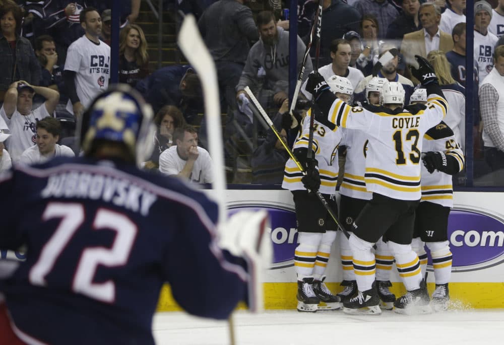 Boston Bruins players celebrate their goal against the Columbus Blue Jackets during the third period of Game 6 of an NHL hockey second-round playoff series Monday, May 6, 2019. (Jay LaPrete/AP)