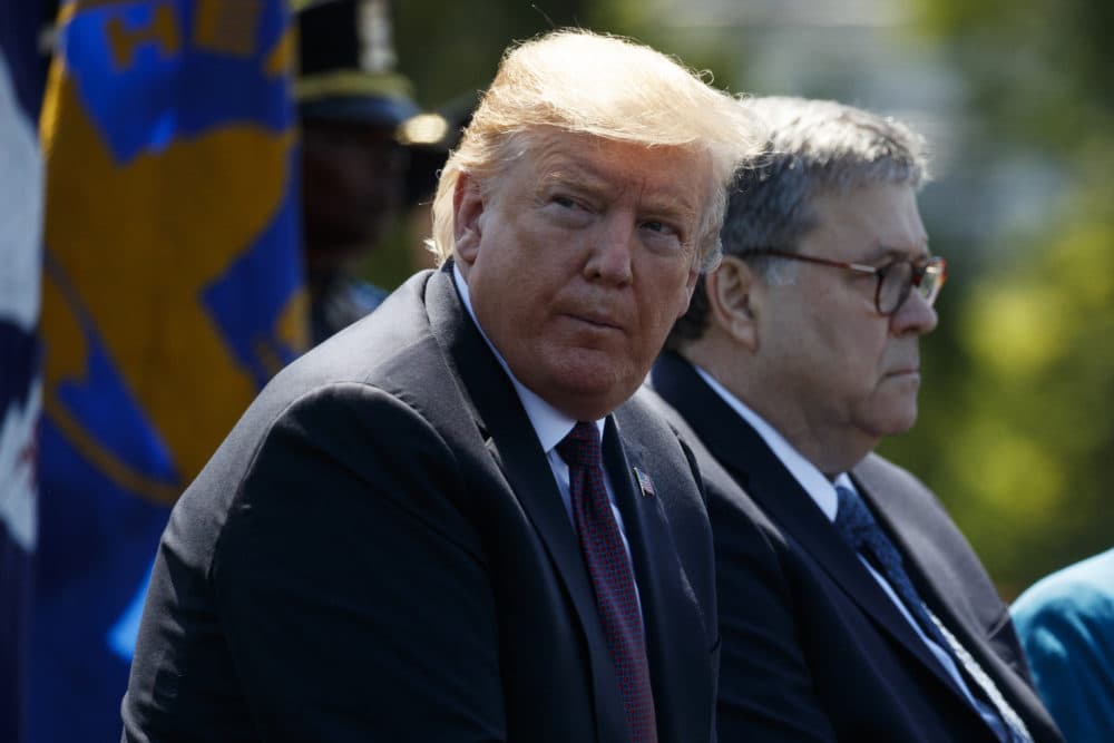 President Donald Trump sits with Attorney General William Barr during the 38th Annual National Peace Officers' Memorial Service at the U.S. Capitol, Wednesday, May 15, 2019, in Washington. (Evan Vucci/AP)