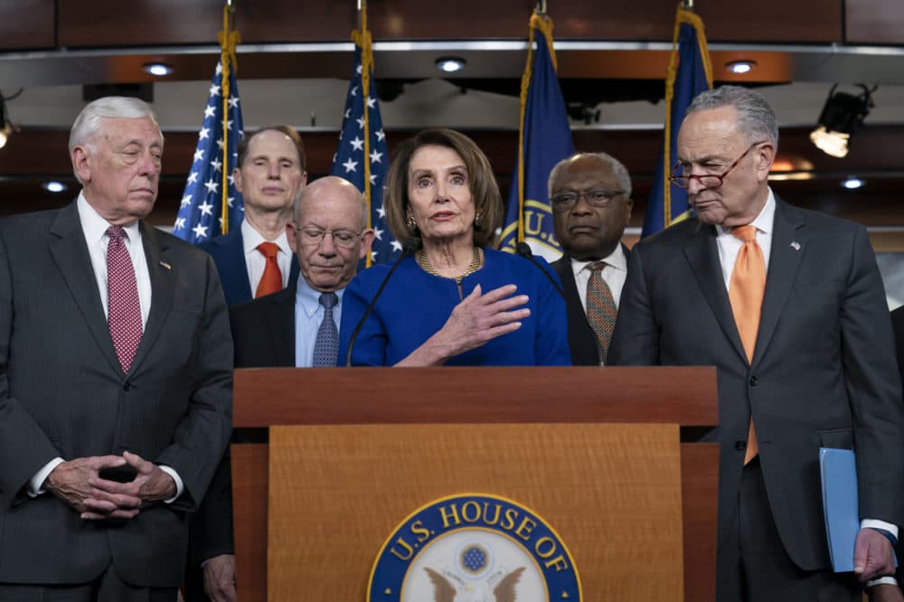 Speaker of the House Nancy Pelosi, D-Calif., center, Senate Minority Leader Chuck Schumer, D-N.Y., right, and other congressional leaders, react to a failed meeting with President Trump at the White House on infrastructure Wednesday. (J. Scott Applewhite/AP)