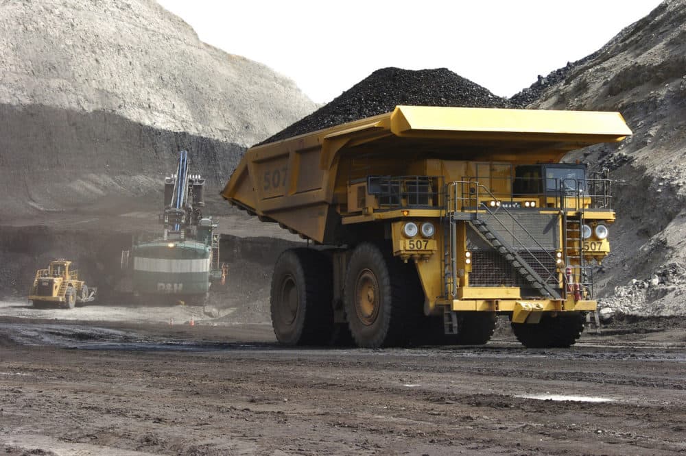 In this April 4, 2013, file photo, a truck carrying 250 tons of coal hauls the fuel to the surface of the Spring Creek mine near Decker, Mont. (Matthew Brown, File/AP)