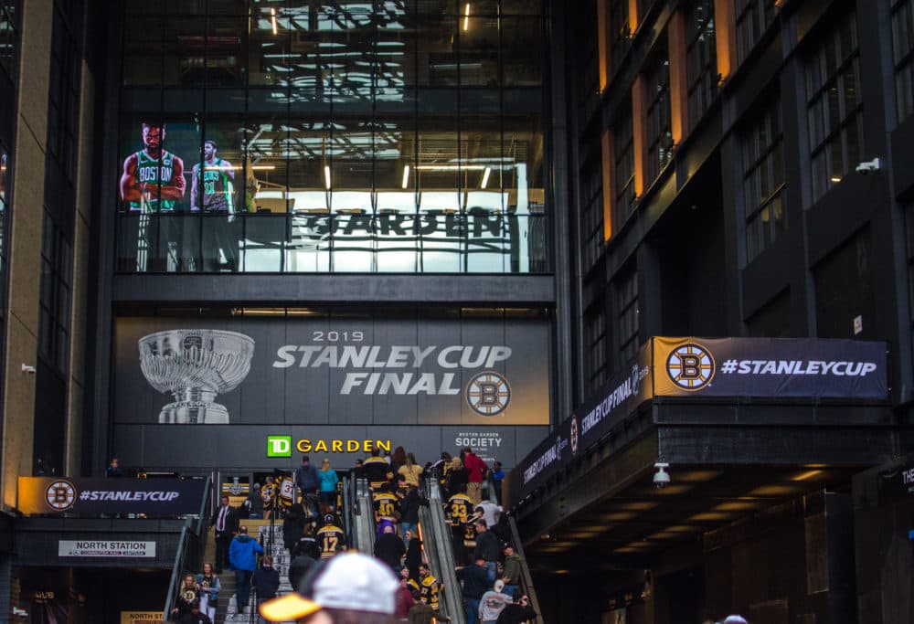 Bruins fans stream into TD Boston Garden to watch a scrimmage in the week before the Stanley Cup Final against the St. Louis Blues. (Sharon Brody/WBUR)
