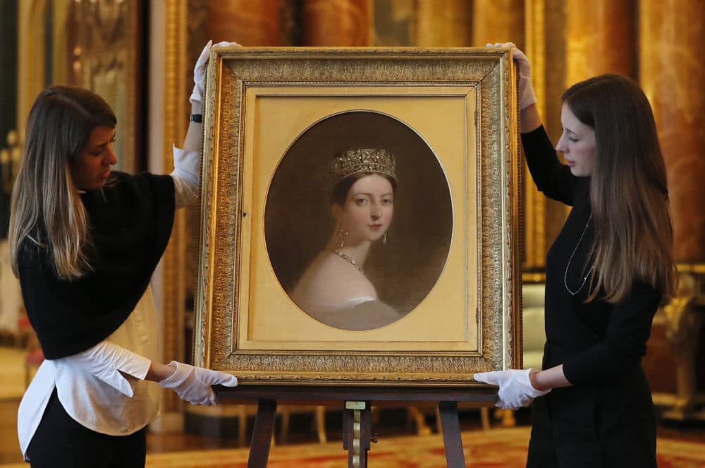 Last month, staff members arranged Thomas Sully's portrait of Queen Victoria, which is part of an exhibition to mark the 200th anniversary of the birth of the queen (1819–1901) this year at Buckingham Palace in London. (Frank Augstein/AP)