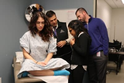 UMass Medical School students with standardized patients during training. (UMass Medical School, Megan Bard)