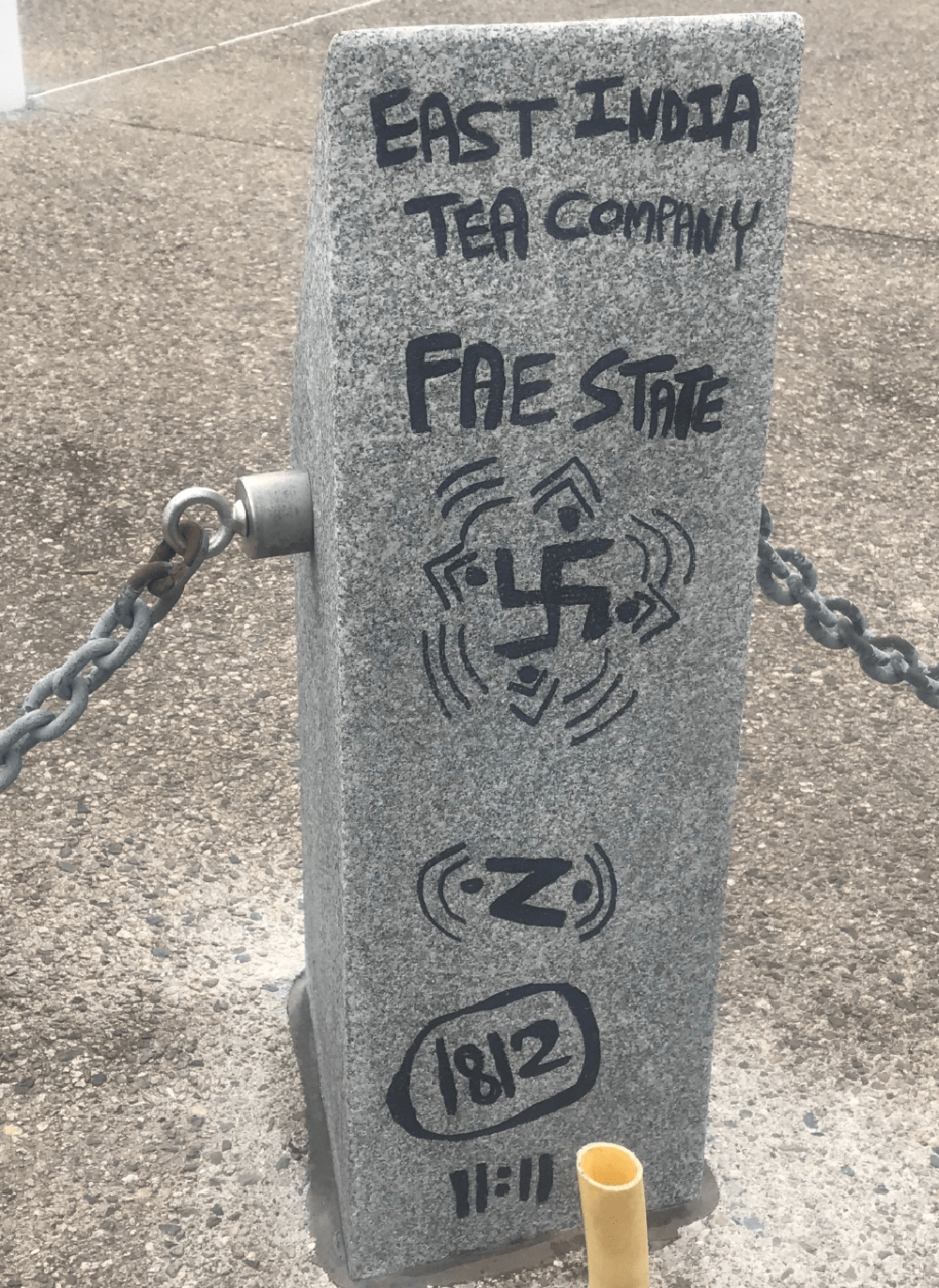 Graffiti found at the Vietnam Veterans monument at UMass Boston. (Photo/Mass. State Police)