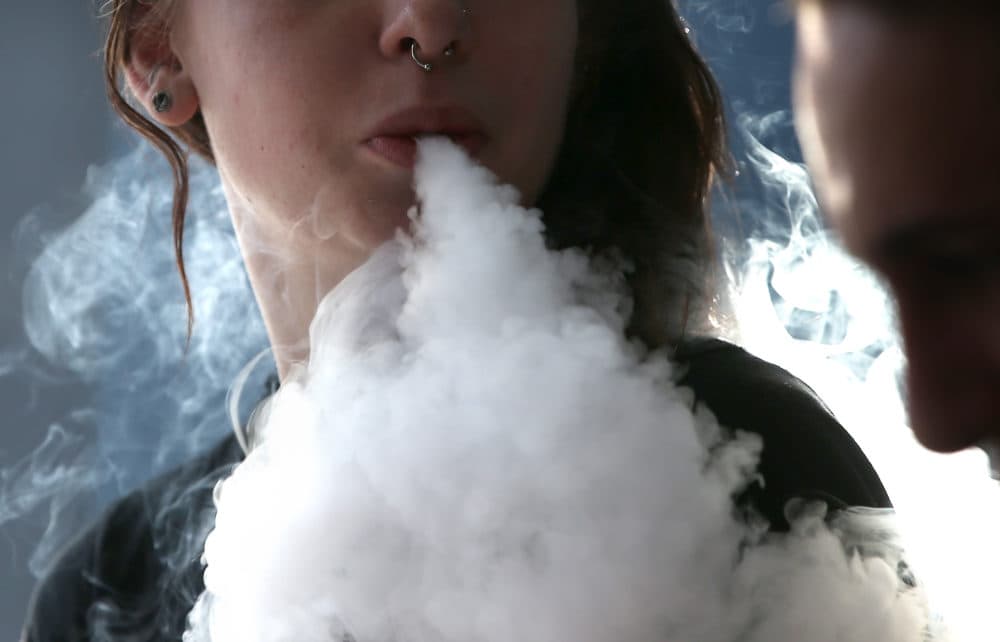 Scientists are still learning new things about the possible health impacts of vaping as the FDA struggles to regulate the booming industry, which could be worth more than $40 billion by 2025. (Justin Sullivan/Getty Images)