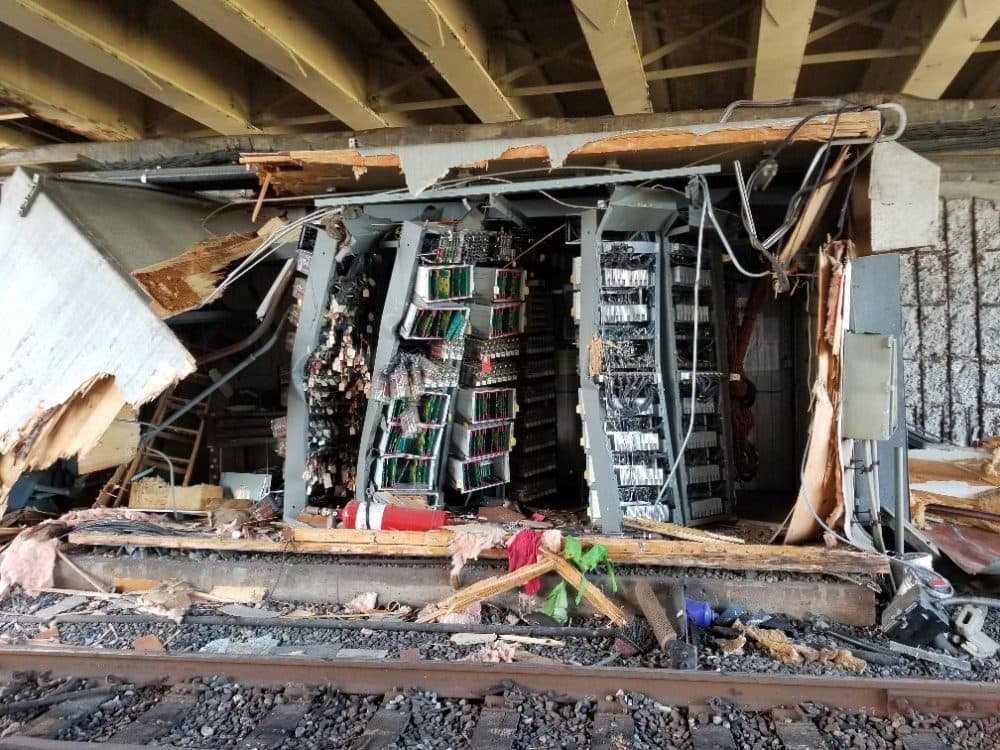 Structures that house MBTA signal equipment were badly damaged when a Red Line train derailed near JFK/UMass Station on June 11, 2019. (Courtesy MBTA)