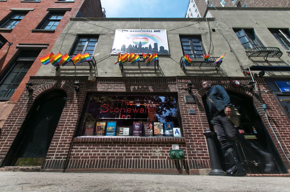 A man walks past the site of Stonewall. June's Pride Month 2019 marks the 50th anniversary of the riots at Stonewall Inn, in New York''s Greenwich Village, which galvanized the Gay Rights Movement in 1969. (Richard Drew, AP Photo)