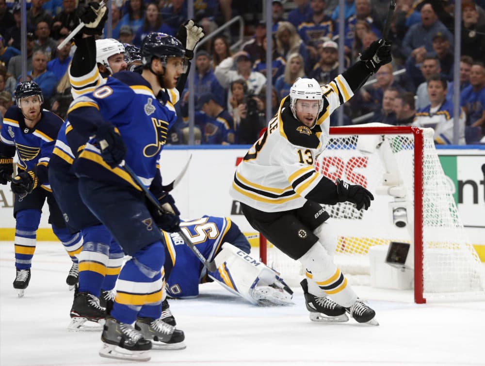 Boston Bruins center Charlie Coyle (13) celebrates after scoring against St. Louis Blues goaltender Jordan Binnington (50) during the first period of Game 4 of the NHL hockey Stanley Cup Final Monday, June 3, 2019, in St. Louis. (Jeff Roberson/AP)
