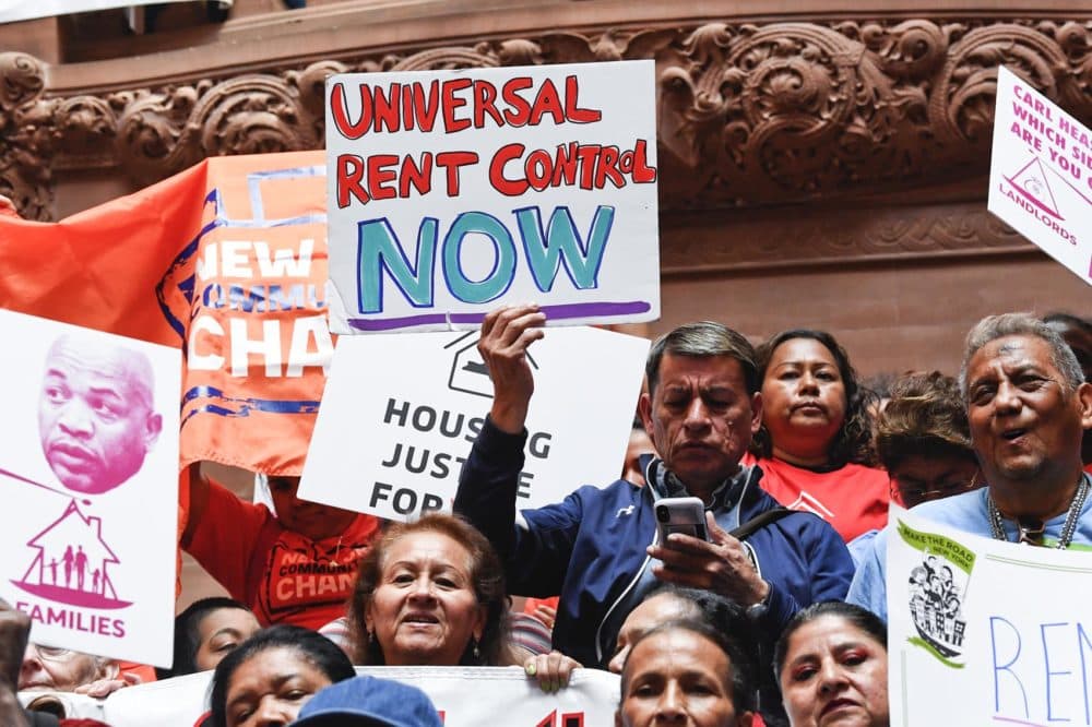 Tenants and members of the Upstate Downstate Housing Alliance from across the state demand New York Gov. Andrew Cuomo and state legislators pass universal rent control legislation at the state Capitol Tuesday, June 4, 2019, in Albany, N.Y. (Hans Pennink/AP)
