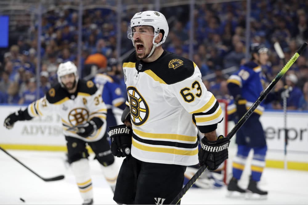 Bruins left wing Brad Marchand celebrates after scoring a goal against the Blues during the first period of Game 6 of the Stanley Cup Final Sunday. (Jeff Roberson/AP)