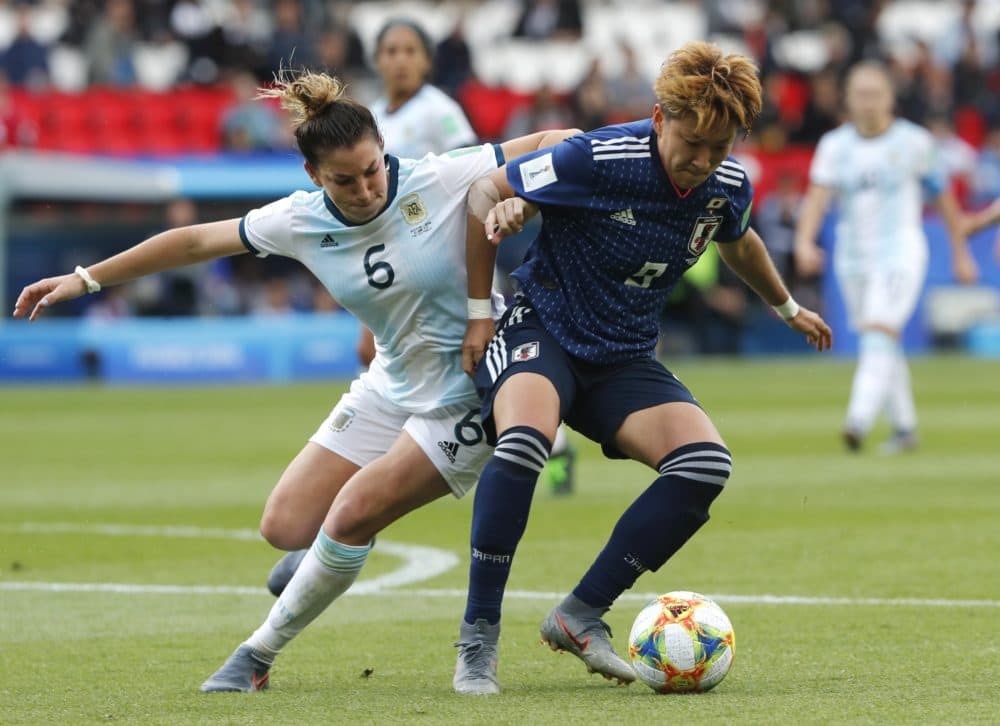 Argentina's Aldana Cometti, left, and Japan's Yuika Sugasawa play during a Women's World Cup match between Argentina and Japan in Paris, France, Monday, June 10, 2019. (Thibault Camus/AP)