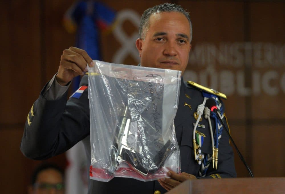 The director of the National Police, General Ney Aldrin Bautista Almonte, shows the weapon that was used to shoot former Boston Red Sox slugger David Ortiz, during a press conference in Santo Domingo, Dominican Republic, on Wednesday. (Roberto Guzman/AP)