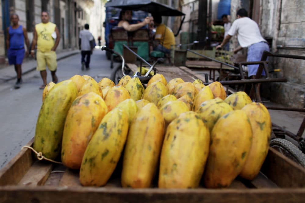 Papayas sit on a cart at a public market in Old Havana, Cuba. (Javier Galeano/AP)