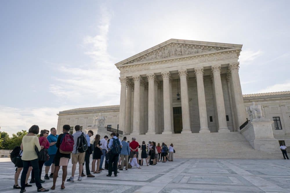 Visitors line up at the Supreme Court in Washington as the justices prepare to hand down decisions, Monday, June 17, 2019. (J. Scott Applewhite/AP)