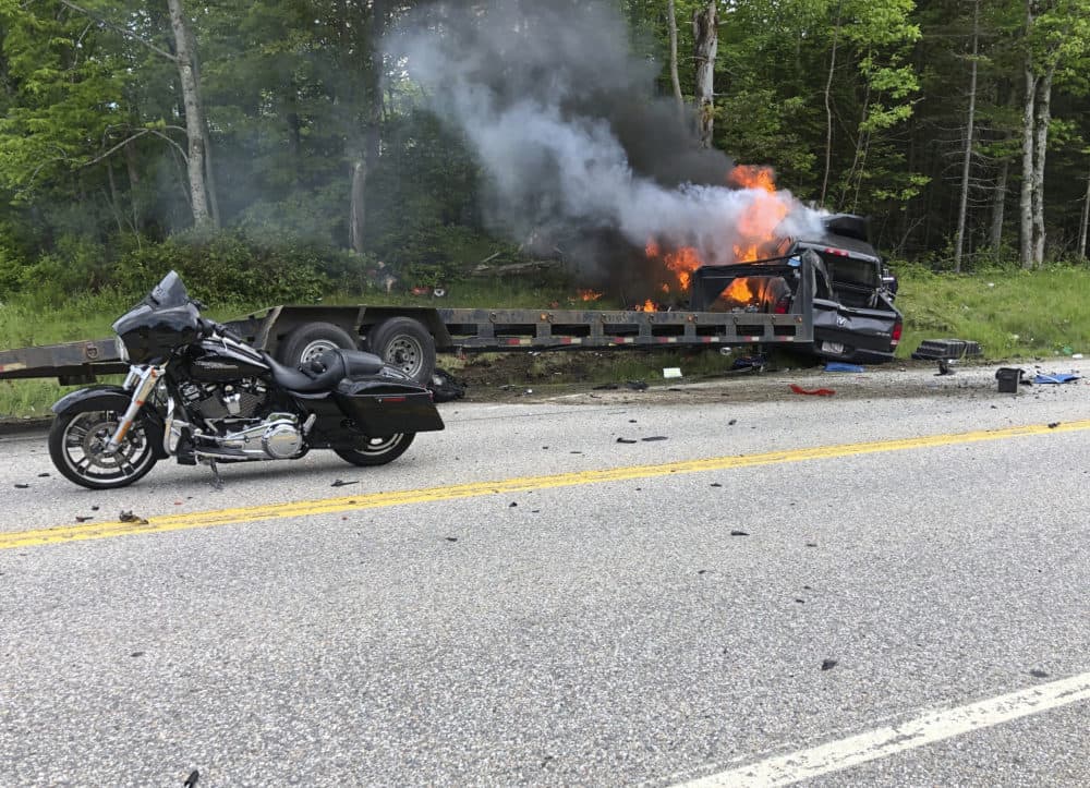Several motorcycles and a pickup truck collided on a rural, two-lane highway Friday, June 21, 2019 in Randolph, N.H. (Miranda Thompson via AP)