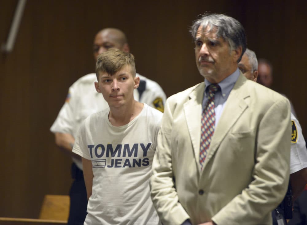 Volodymyr Zhukovskyy, 23, of West Springfield, stands with his attorney Donald Frank during his arraignment in Springfield District Court in June. (Don Treeger/The Republican via AP, Pool)