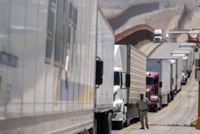 Cargo truck drivers line up to cross to the United States at Otay commercial crossing port in Tijuana, Baja California state, on June 6, 2019, Mexico. (Guillermo Arias/AFP/Getty Images)