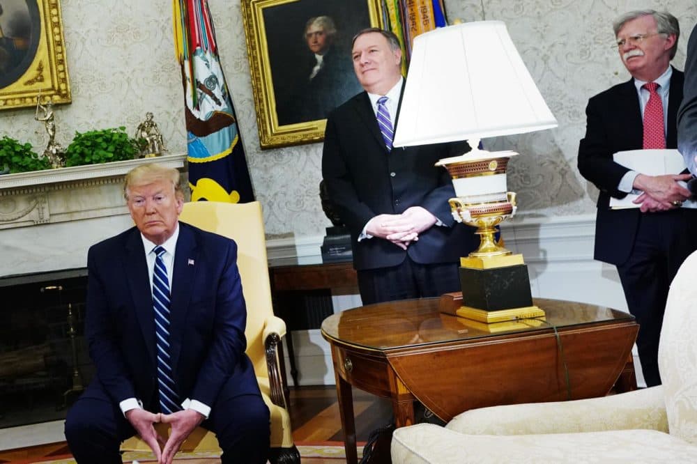 (From left) President Trump, Secretary of State Mike Pompeo, and National Security Adviser John Bolton are seen during a bilateral meeting with Canada's Prime Minister Justin Trudeau in the Oval Office of the White House in Washington, D.C. on June 20, 2019. (Mandel Ngan/AFP/Getty Images)