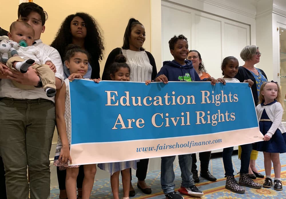 Parents and students from seven Massachusetts communities say they filed the lawsuit because legislative efforts to get more funding for their schools are taking too long and don’t go far enough. (Carrie Jung/WBUR)