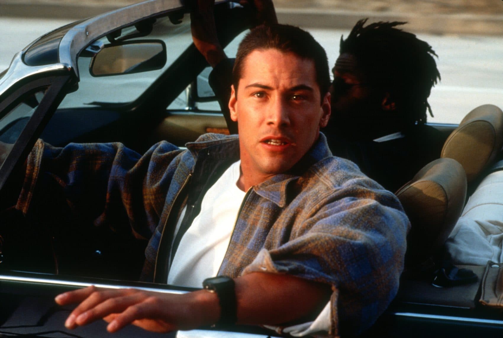 Keanu Reeves, left, as Officer Jack Traven with Glenn Plummer as Maurice (aka Jaguar Owner) in &quot;Speed&quot; (1994). (Courtesy Twentieth Century Fox/Photofest)