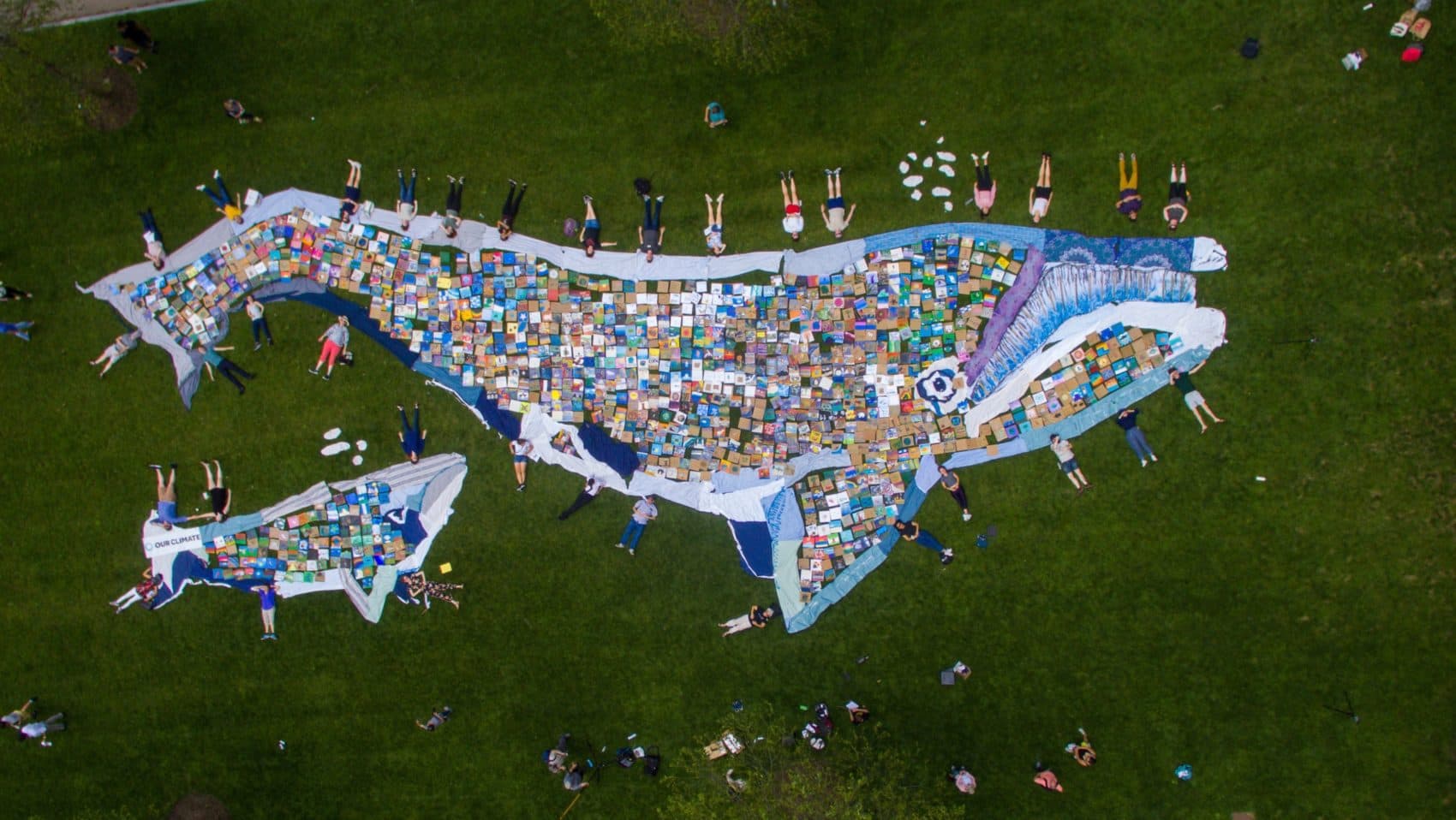 Young climate activists constructed a 100-foot mosaic out of 1,200 individually painted tiles. (Courtesy of Lucian Sharpe/Our Climate)