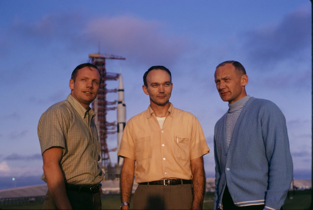 Apollo 11 astronauts Neil Armstrong, Michael Collins, and Buzz Aldrin stand near their spacecraft. (Otis Imboden/National Geographic Creative)