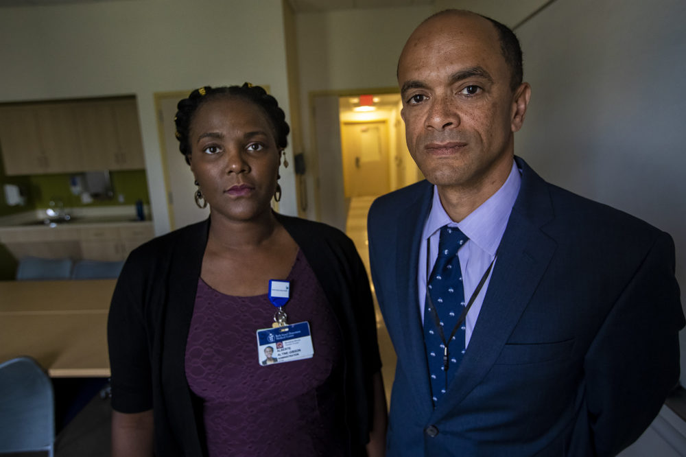 Alberte Altine-Gibson, left, and Dr. Kamau Karanja at the Bowdoin Street Health Center. (Jesse Costa/WBUR)