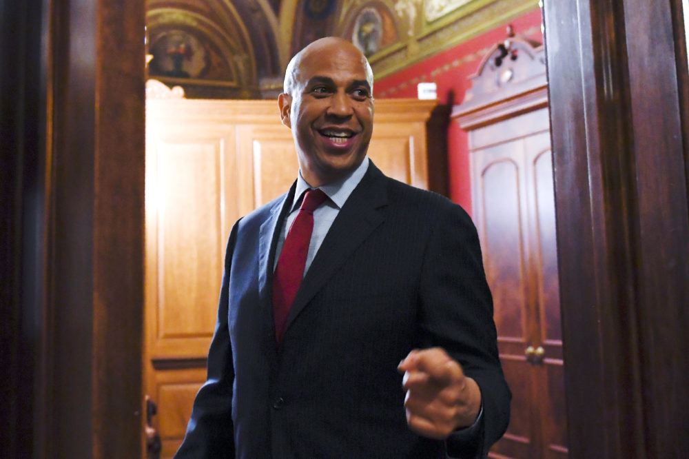 Sen. Cory Booker, D-N.J., goes to a meeting on Capitol Hill in Washington on July 9. (Susan Walsh/AP)
