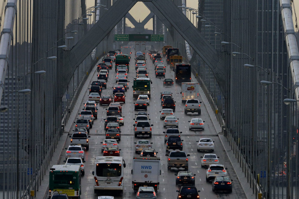 In this Dec. 10, 2015, file photo, vehicles make their way westbound on Interstate 80 across the San Francisco-Oakland Bay Bridge as seen from Treasure Island in San Francisco. (Ben Margot, File/AP)