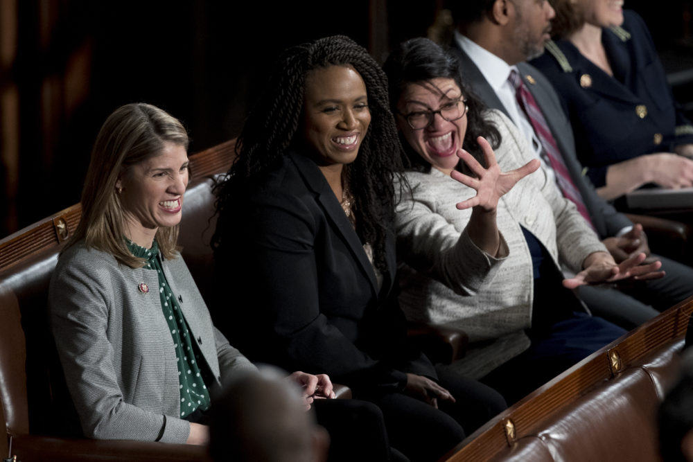 Freshmen Massachusetts U.S. Reps. Lori Trahan, left, and Rep. Ayanna Pressley, center, are seen ahead of a Joint Meeting of Congress on April 3. (Andrew Harnik/AP)