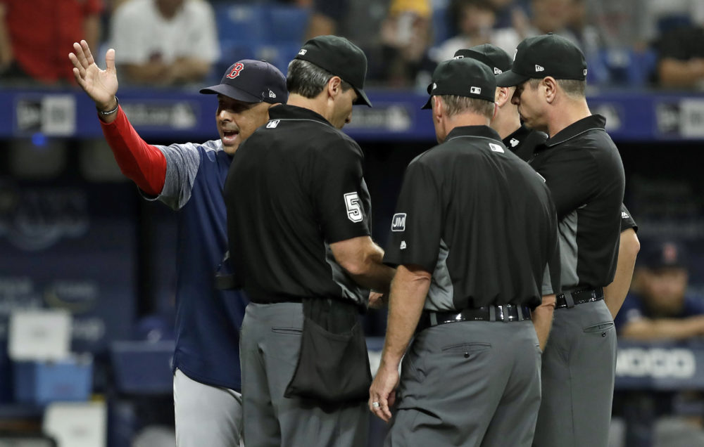 Boston Red Sox manager Alex Cora yells at umps during the eighth inning of Red Sox/Rays game on July 24. (Chris O'Meara/AP)