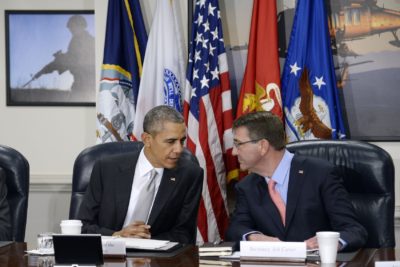 President Barack Obama (left) and U.S. Defense Secretary Ash Carter talk during a national security council meeting on the counter-ISIL campaign at the Pentagon Dec. 14, 2015 in Arlington, Va. (Olivier Douliery-Pool/Getty Images)